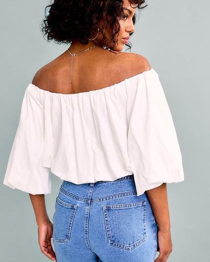 Feminine flowy off the shoulder shirt