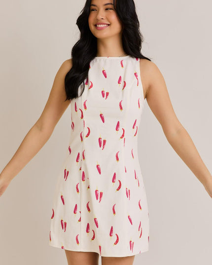 100% cotton mini dress with red pepper print