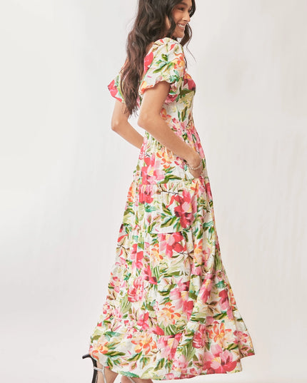 Woman wearing a floral dress on a white background
