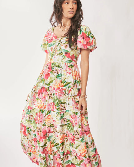 Woman wearing a floral dress on a white background