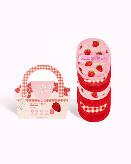 makeup eraser set with multiple red print make up eraser cloths including straberry print and gingham and packaging looks like a picnic basket or purse