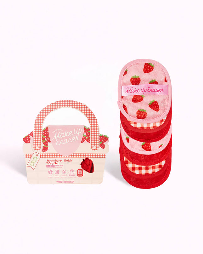 makeup eraser set with multiple red print make up eraser cloths including straberry print and gingham and packaging looks like a picnic basket or purse