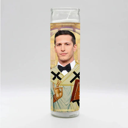 Candle with a printed design featuring a person in formal attire on a gray background