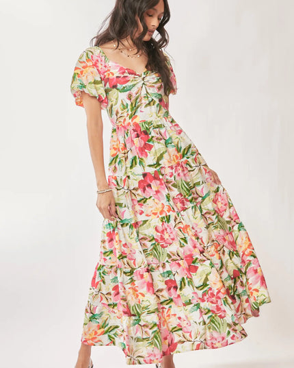Woman wearing a floral dress on a white background