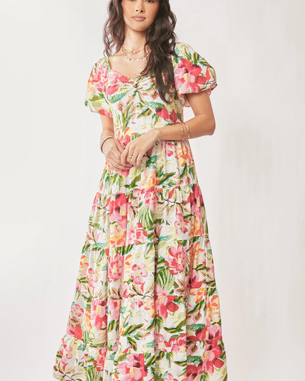 Woman wearing a floral dress on a white background