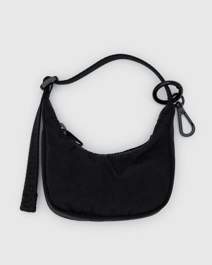 Black shoulder bag on a light gray background