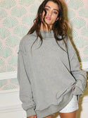 Charcoal gray oversized reversible mockneck sweatshirt with vintage wash
