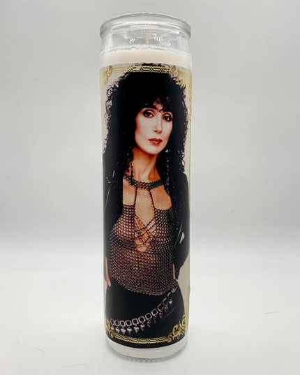 Candle with a portrait of a famous person on a white background