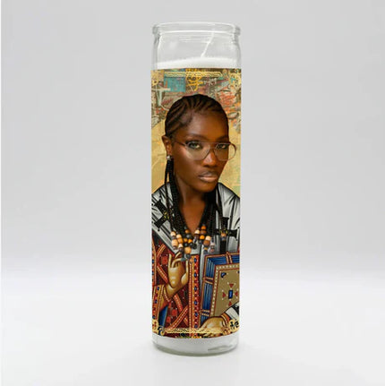 Candle with a portrait of a person on a colorful background