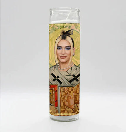 Candle with a portrait of a person with a headband and cross on a gray background