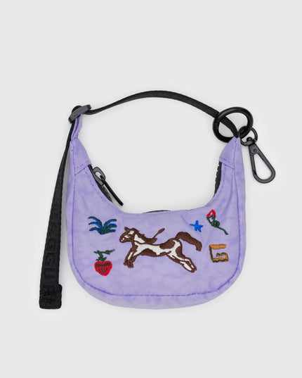 Small purple bag with embroidered designs on a light gray background