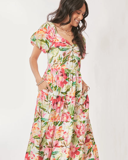 Woman wearing a floral dress on a white background