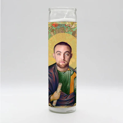 Candle with a portrait of a man on a colorful background