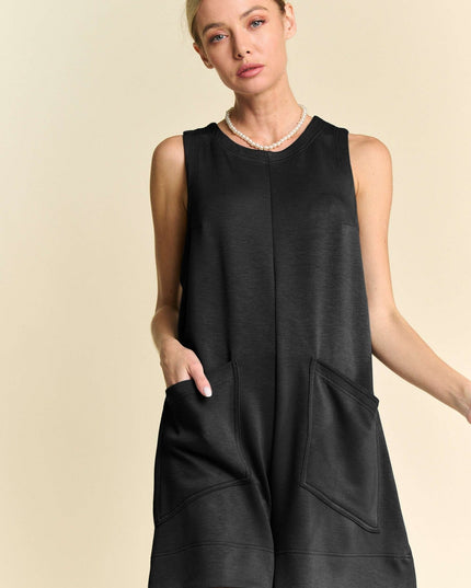 Black sleeveless pocket romper with relaxed fit from Calli’s Curations, styled for day-to-night versatility