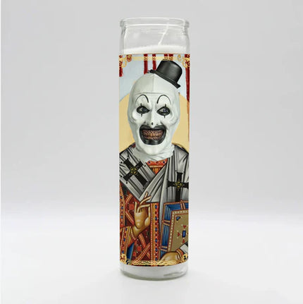 Candle with a printed design of a character in a top hat and suit on a white background