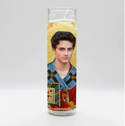 Candle with a portrait of a person on a gold background