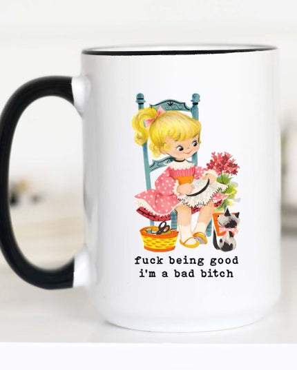 little blonde girl in a rocking chair next to a cat. cottage core look. text says fuck being good i'm a bad bitch