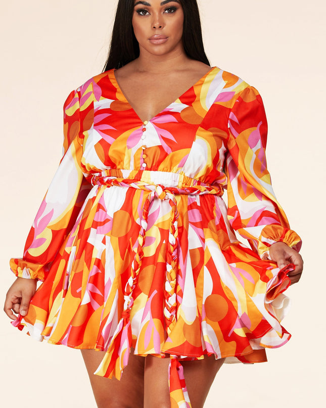 orange and yellow 70s geo print vintage inspired long sleeve dress with braided belt and vanity buttons on a v neck