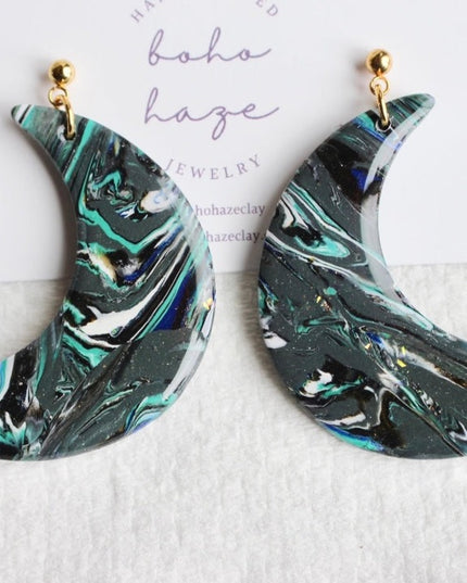 large galaxy moon baby dangles