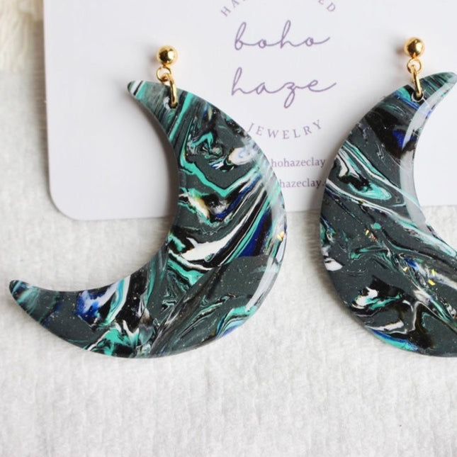 large galaxy moon baby dangles