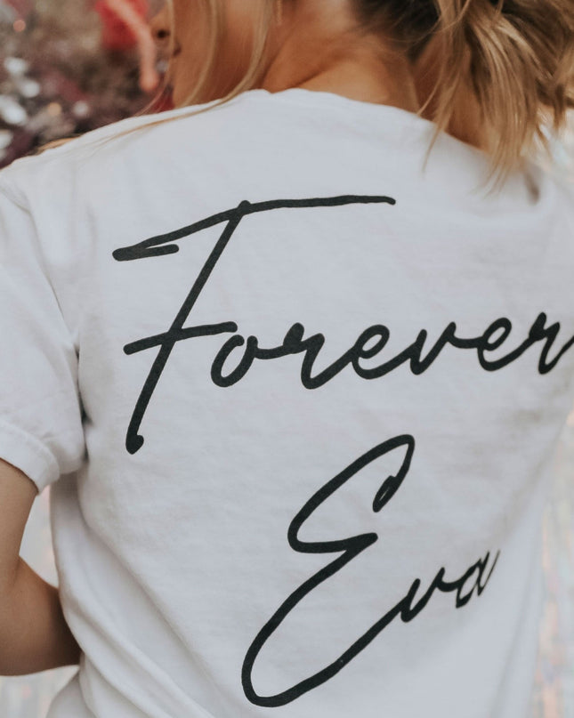 white tee shirt with "Forever eva" written in a cursive like font on the back and smaller on the front
